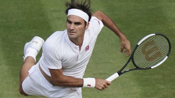 Federer thống trị Wimbledon và cũng giữ kỷ lục sáu lần vô địch ATP Finals.  Ảnh: Wimbledon